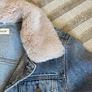 Worn once. Lightweight denim jacket with fur neckline